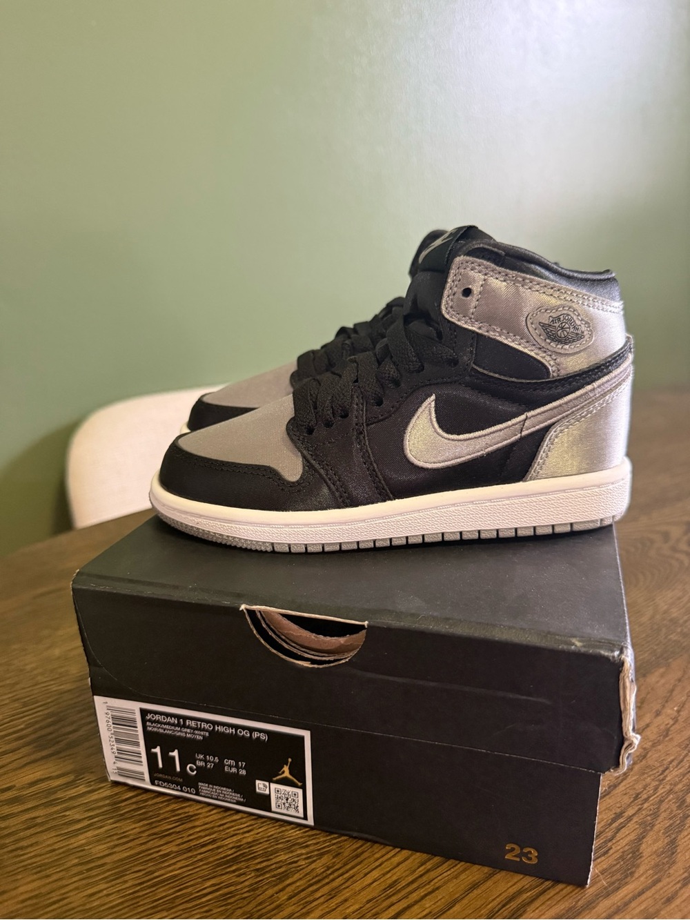 Nike Kids' Air Jordan 1 Mid Black and Metallic Silver Sneakers